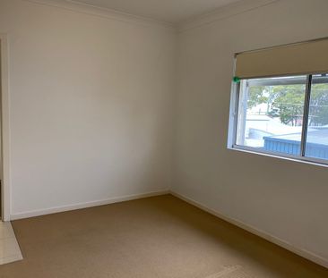 2-Bedroom Unit with Private Courtyard in Prime Location - Photo 1