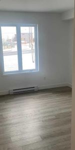 5 1/2 à louer à St-Nicolas, 1ier étage, 3 chambres, climatisé, granit, stationnement intérieur, internet et lockers inclus, 1ier juillet 2024 - Photo 3