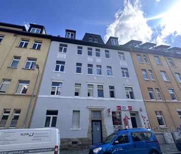 Moderne DG-Wohnung mit Balkon! - Foto 1