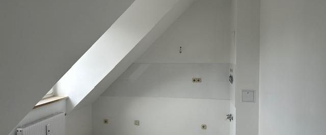 Schöne 2-Zimmer Dachgeschosswohnung in idyllischer Lage - Foto 1