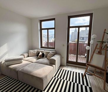 Traumhafte 2-Raum-Wohnung mit Balkon, Einbauküche und Kamin in ruhi... - Foto 1