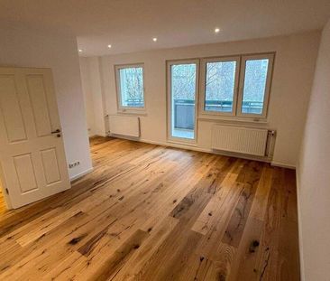 Einziehen und Wohlfühlen: Moderne 3 -Zimmer-Wohnung mit Einbauküche... - Foto 1