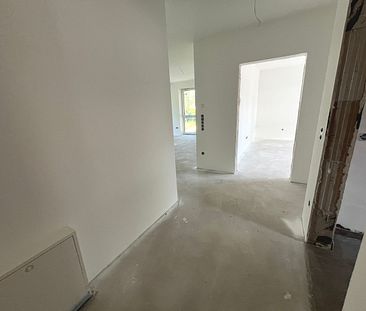 *Neubau: 2-Zimmer Mietwohnung im 1.OG mit Stellplatz & Loggia im Neubaugebiet in Rheine-Eschendorf* - Photo 2