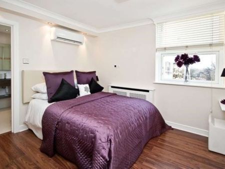This three bedroom apartment is set on the fourth floor of a private gated development set in communal gardens. - Photo 4