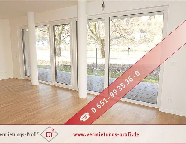 Exklusiv wohnen direkt an der Mosel – Hochwertige 2ZKB Erdgeschosswohnung mit Einbauküche, großer Terrasse & Tiefgaragenstellplatz! - Foto 1