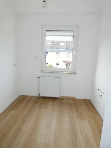 Modernisierte 3-Zimmer-Maisonette-Wohnung im gepflegten Zweifamilienhaus. - Photo 3