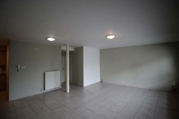 Een gezellig appartement op benedenverdieping vooraan - met garage - Photo 1