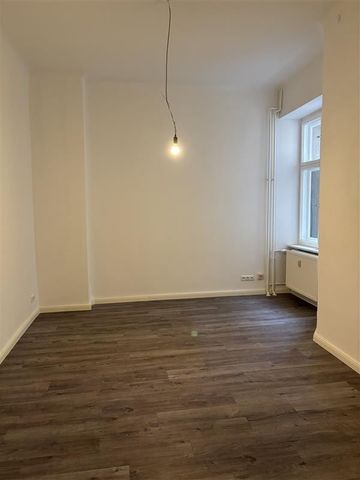 Attraktive Erdgeschosswohnung in zentraler Lage! - Photo 2