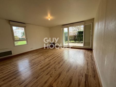 APPARTEMENT T3 - REZ-DE-JARDIN - QUARTIER MAIRIE - Photo 2
