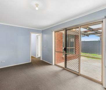 Presentable 2 bedroom unit with outdoor space and carport - Photo 1