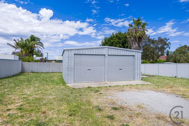 Neat & Tidy Home with Workshop and Side Access - Photo 1