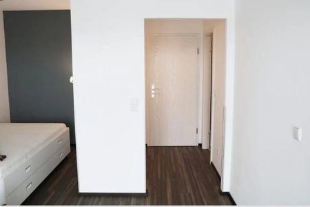 Moderne 1-Zimmer-Wohnung mit Wintergarten - Photo 2