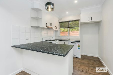 Renovated with plenty of modern conveniences - Photo 3