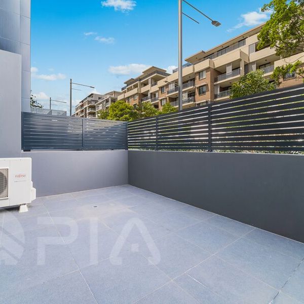 Split level with bedroom in upper level at Shepherds Bay**Entry via block B on Belmore st** - Photo 1