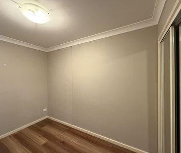 Modern Inner-City Living with Pool & Gym Access - Photo 2