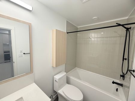 One Bedroom and Den with Parking and Storage in Convenient Surrey Central - Photo 5