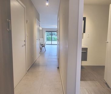 Gelijkvloers modern appartement met ruim terras en tuintje - Foto 4