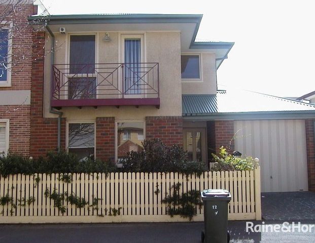 Updated spacious home with large year yard - Photo 1