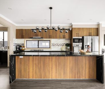 Four-bedroom family home offers modern luxury in a prime location - Photo 6