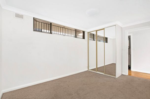 Ultra Convenient Apartment with Secure Garage - Photo 1