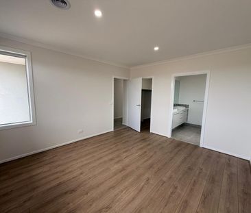 BRAND NEW FAMILY HOME IN A CONVENIENT CLYDE NORTH LOCATION! - Photo 2