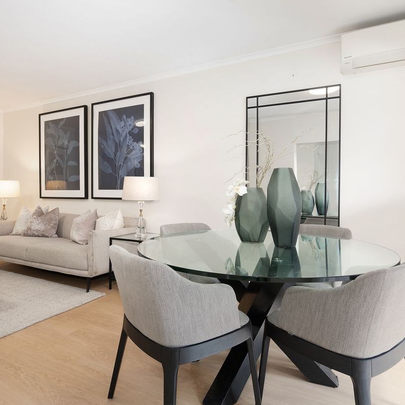 Peaceful rear-of-block apartment in a prime walk-to-everything location - Photo 1