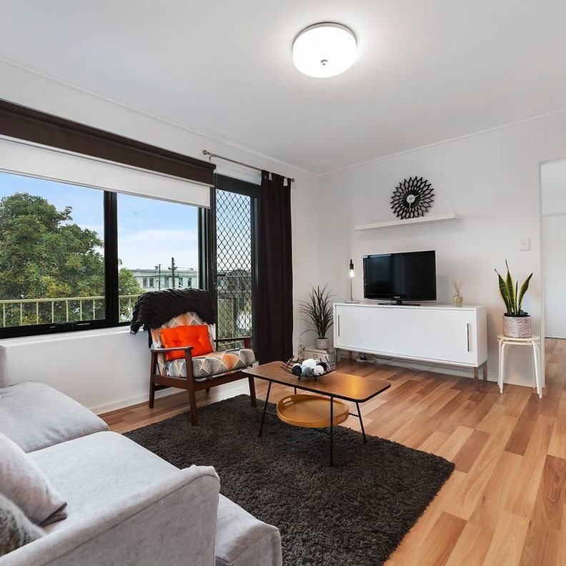 TOP-FLOOR TREAT WITH LIGHT AND STYLE! - Photo 1