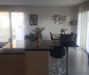 Appartement de 4.5 pièces au rez-de-chaussée - Photo 1