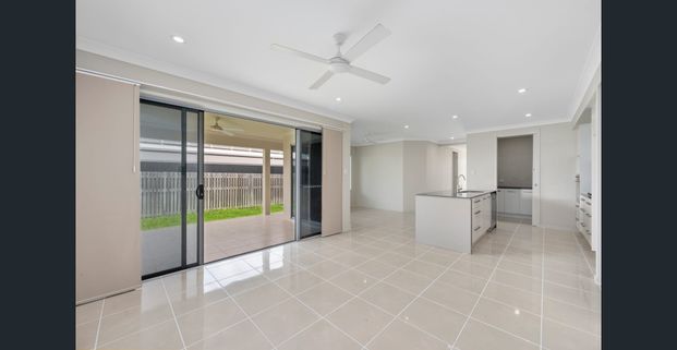 Luxurious Family Home with Premium Features - Photo 1