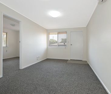 Renovated unit in sought after location - Photo 1