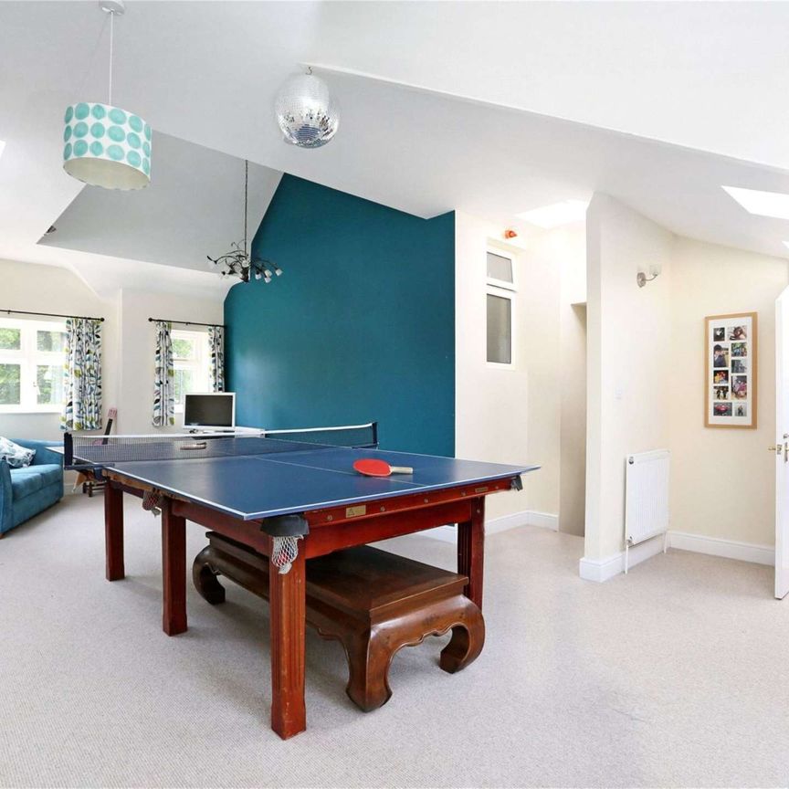 A superb family home offering flexible accommodation of four/five bedrooms with garage, garden and off street parking. - Photo 1