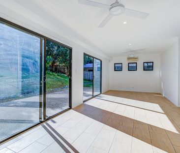 Spacious Family Home with Multiple Living Areas – Prime Location - Photo 1
