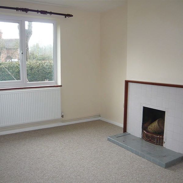 3 bedroom semi detached cottage in a semi rural position with good size surrounding gardens and garage. - Photo 1