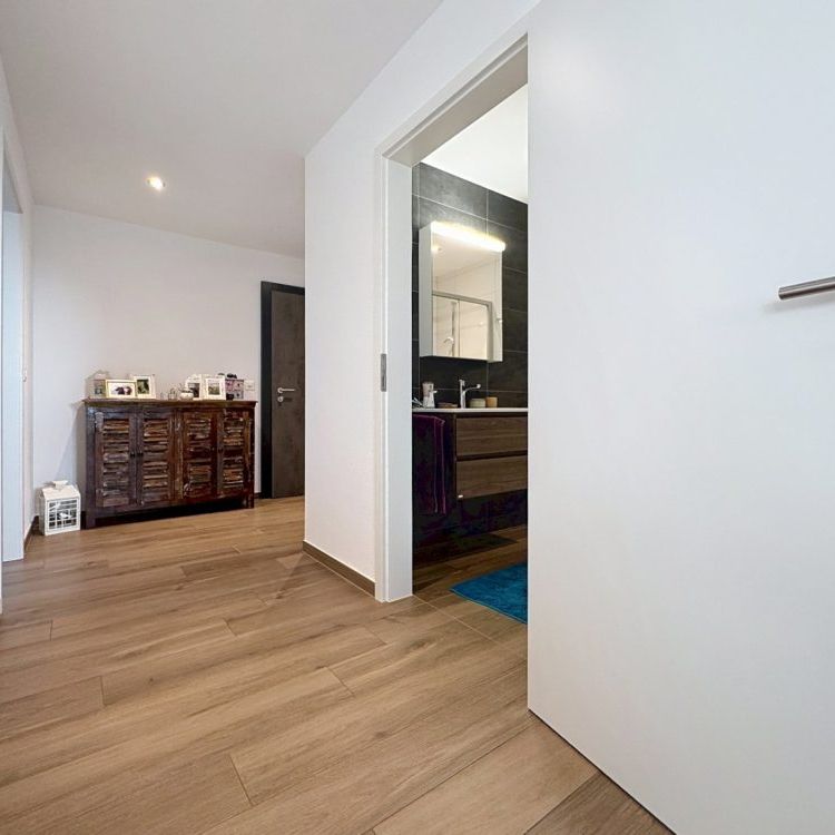 Appartement de 2,5 pièces au rez-de-chaussée - Photo 1