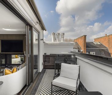 Exquisite three-bedroom duplex penthouse in Kensington - Photo 1