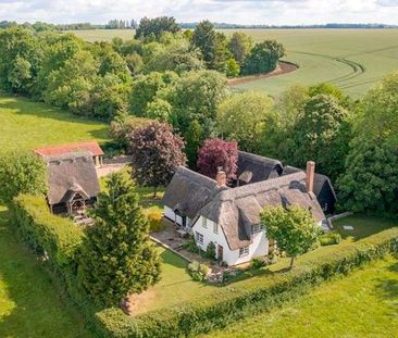 A spacious detached family home set within beautifully maintained g... - Photo 2