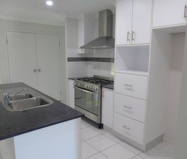 Large Four Bedroom Home with Shed & Garage - Photo 5