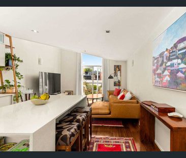 Stylish, Light-Filled Apartment with High Ceilings & Flexible Living - Photo 3