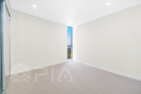 Condition as NEW 2 Bed Apartment with massive Study Area 2 Bath (one with bathtub) 2 Car Spaces - Photo 2