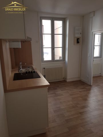 TRIPLEX CENTRE CHARLIEU 66.19 M2 - Photo 2