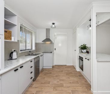 Beautifully Maintained 3-Bedroom Home with Sunroom & Large Backyard - Photo 5