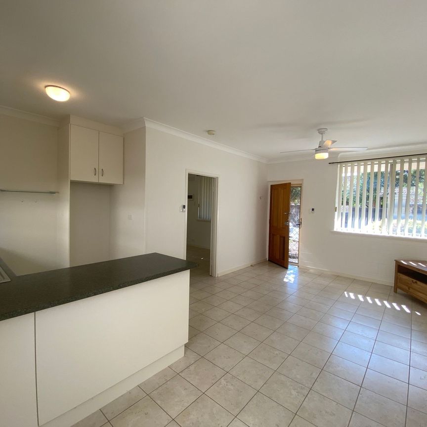 Immaculately maintained unit in a sought-after location - Photo 1