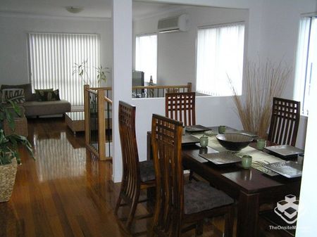 TOWNHOUSE IN BEAUTIFUL GATED COMPLEX - Photo 2