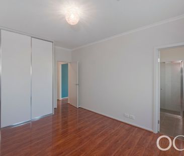 Open the Door To Elevated Modern Living in a Versatile Family Home - Photo 3