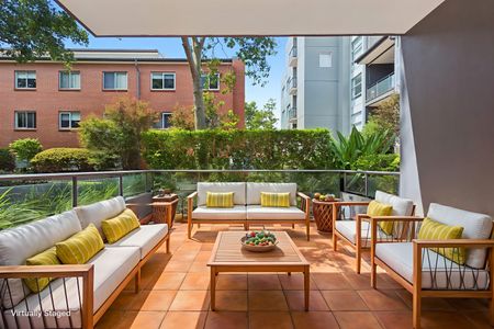 Comfortable & Conveniently Situated Two Bedroom Apartment - Photo 2