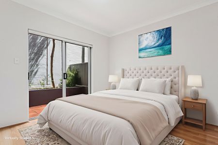 Comfortable & Conveniently Situated Two Bedroom Apartment - Photo 4