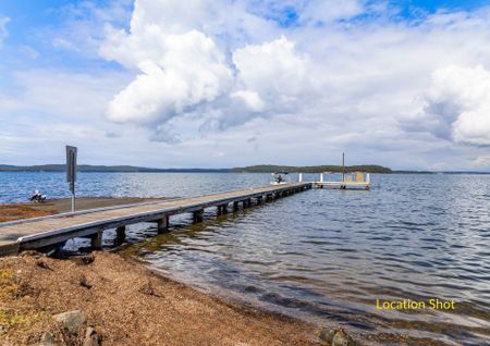 UNIQUE GARDEN OASIS - 3 BEDROOM HOME WITH STUDIO & LAKE VIEWS - Photo 3