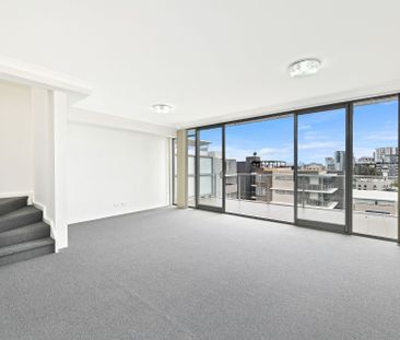Modern 2-Bedroom Apartment with Rooftop Terrace & City Views - Photo 5