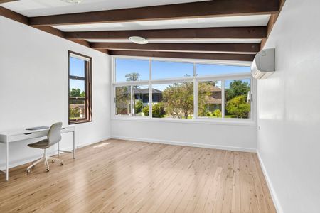 LIGHT-FILLED FAMILY RETREAT OFFERING SPACE AND CONVENIENCE - Photo 3