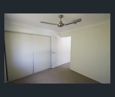 Comfortable Four-Bedroom Home with a Fully Fenced Yard - Photo 6